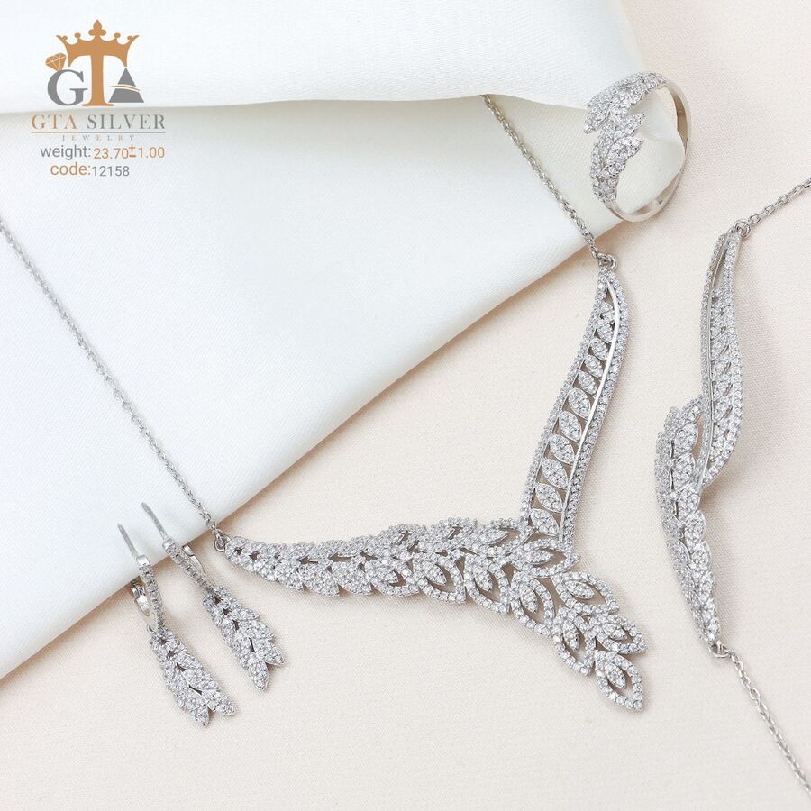 01ee1b8b-a09e-4a97-b964-abb386ea41c8.jpg سرویس نقره میکرو زنجیری کد 12158 - Image 1