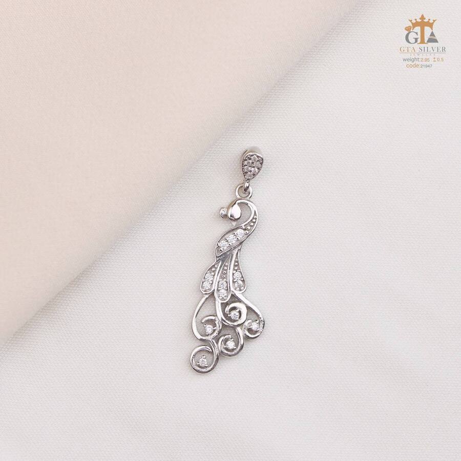 03a79a79-ebd4-47c1-820a-52193bd92334.jpg مدال نقره زنانه طاووس میکرو کد 21947 - Image 1