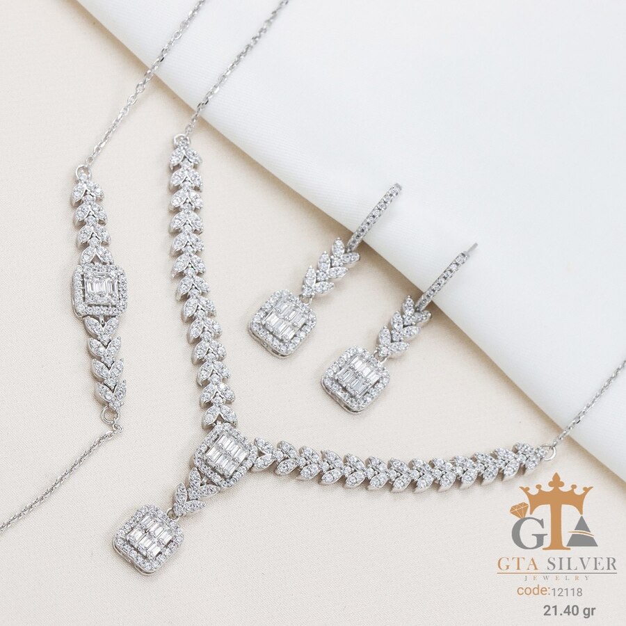 21809b92-c22c-4f21-a3fe-09ed73838093.jpg سرویس نقره میکرو زنجیری طرح امرالدکات کد 12118 - Image 1