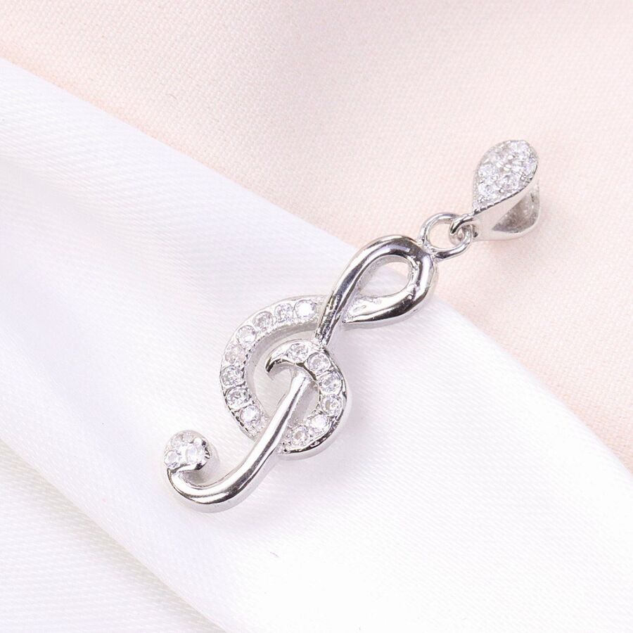 24755668-cf25-4a06-acc1-9de5f639a804.jpg مدال نقره میکرو طرح نت موسیقی کد 21577 - Image 1