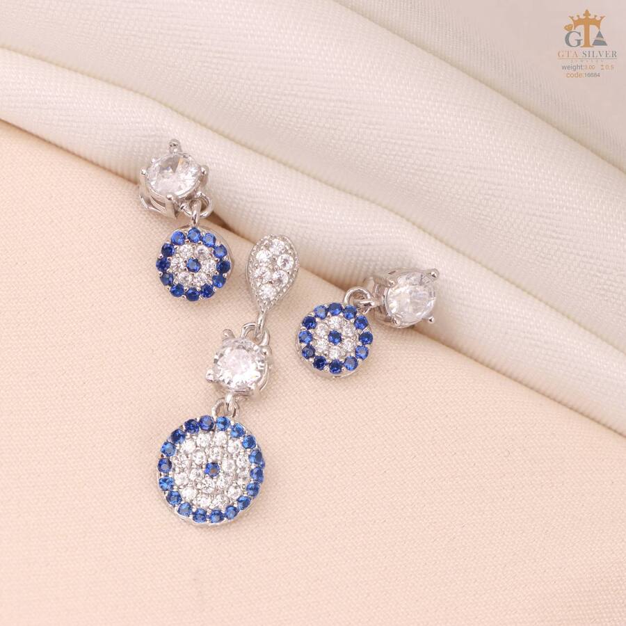 2797b863-ce99-43c0-ad30-016896d62b04.jpg نیم ست نقره طرح چشم نظر کد 16684 - Image 1