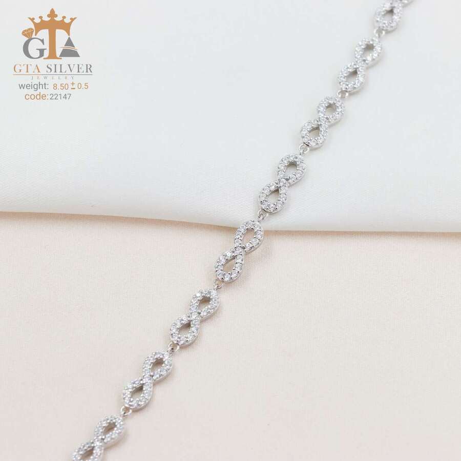 2876f04d-1f8e-4395-bcbe-156f71759617.jpg دستبند نقره زنانه میکرو طرح بینهایت کد 22147 - تصویر 1