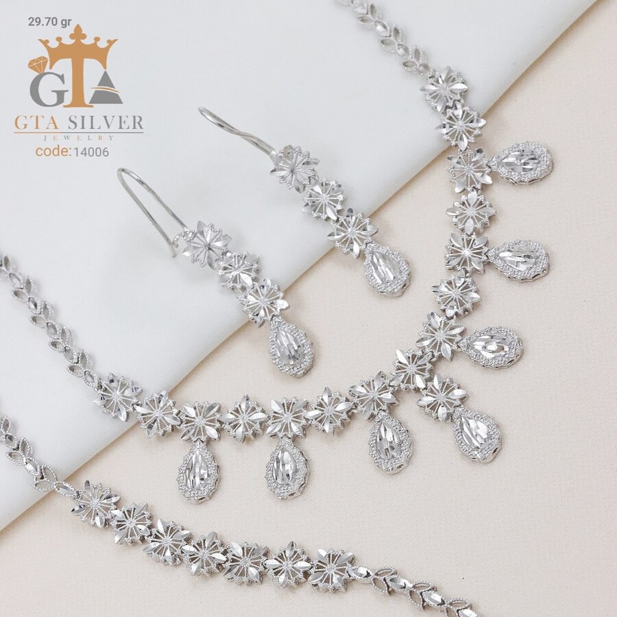 5b0bb5e1-912e-428b-be14-65d52f6c36d9.jpg سرویس نقره تراش بدون نگین کد 14006 - Image 1