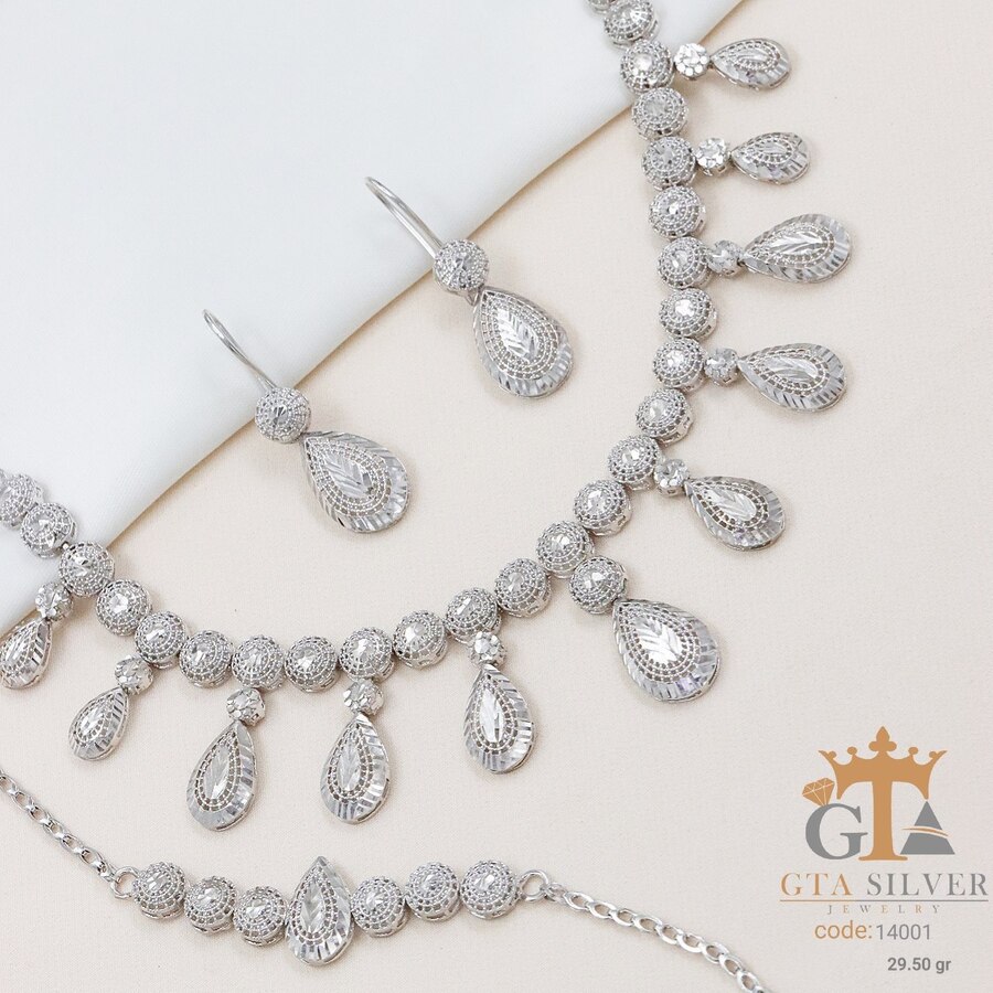 5fb04f54-31ea-42d0-8c4c-23d8b61e5b96.jpg سرویس نقره تراش بدون نگین کد 14001 - تصویر 1