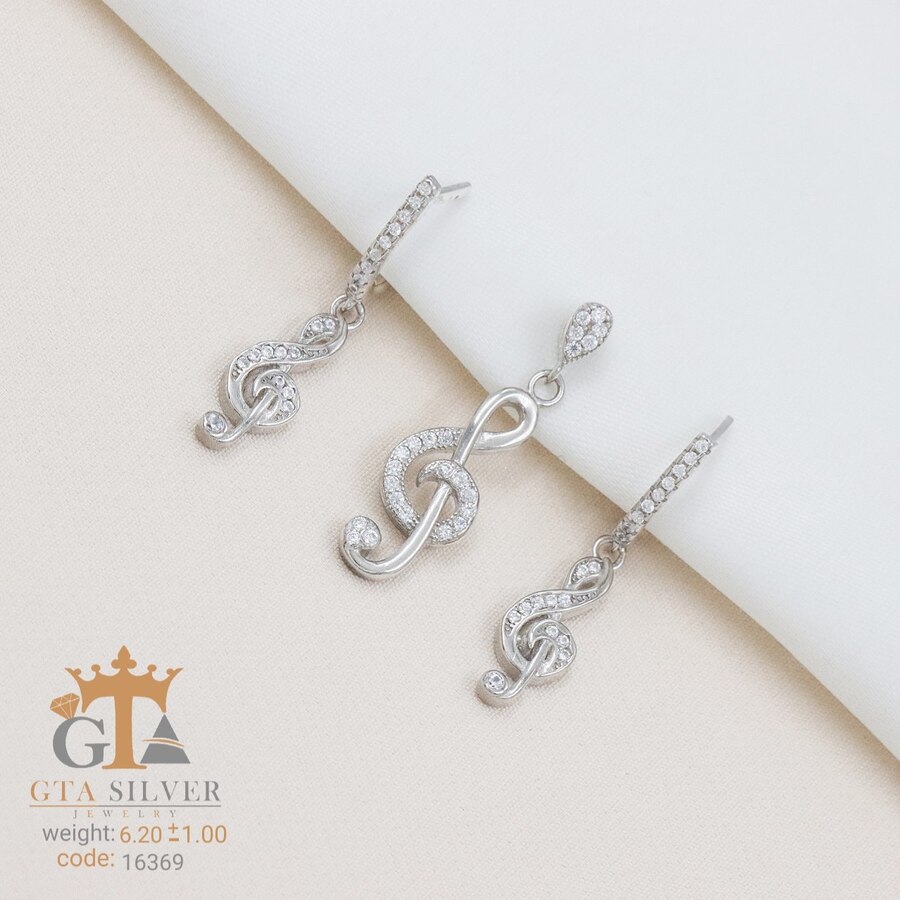 6b6ffcd0-3c3c-4fad-b3ec-298bdfe1bf10.jpg نیم ست نقره میکرو طرح نت موسیقی کد 16369 - تصویر 1