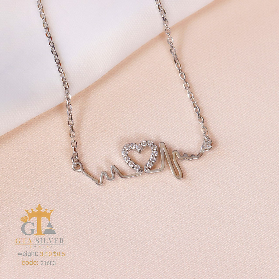 8965b1a3-67b6-43e8-ad22-13f831753bfc.jpg مدال نقره میکرو طرح ضربان قلب کد 21683 - تصویر 1