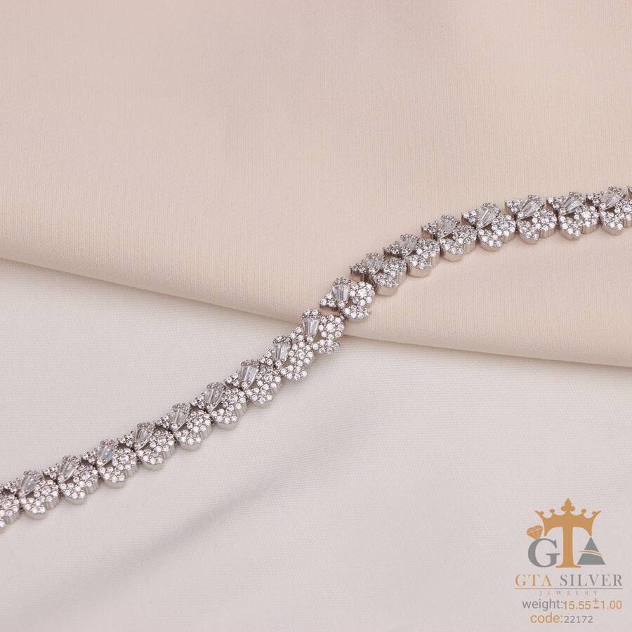 aad03358-dc6e-47e4-af4a-6ef3a91d2234.jpg دستبند نقره زنانه نگین دار طرح فلاور کد 22172 - تصویر 1