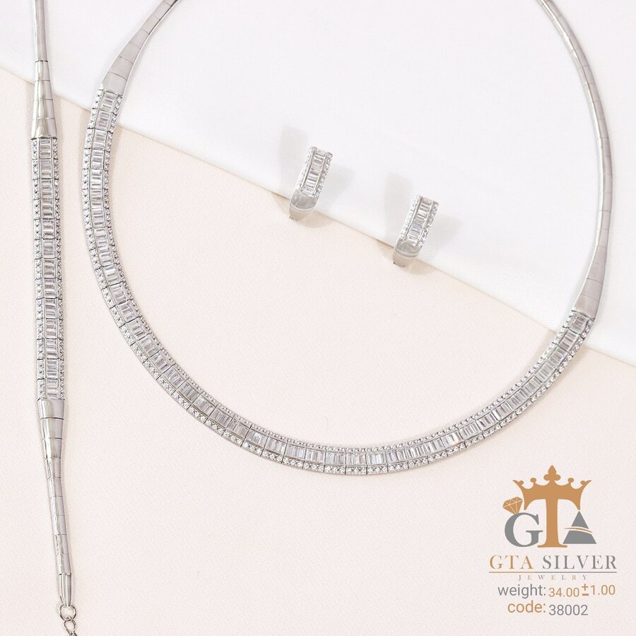 b45e3254-75d8-4d3d-8a64-94ab3c745406.jpg سرویس نقره زنانه طرح تنیسی سوپر میکرو کد 38002 - تصویر 1