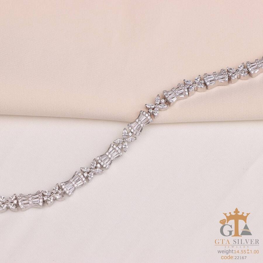 e0841a89-fca2-42fc-bc99-b642f31d5069.jpg دستبند نقره زنانه با سنگ باگت سوئیسی کد 22167 - تصویر 1