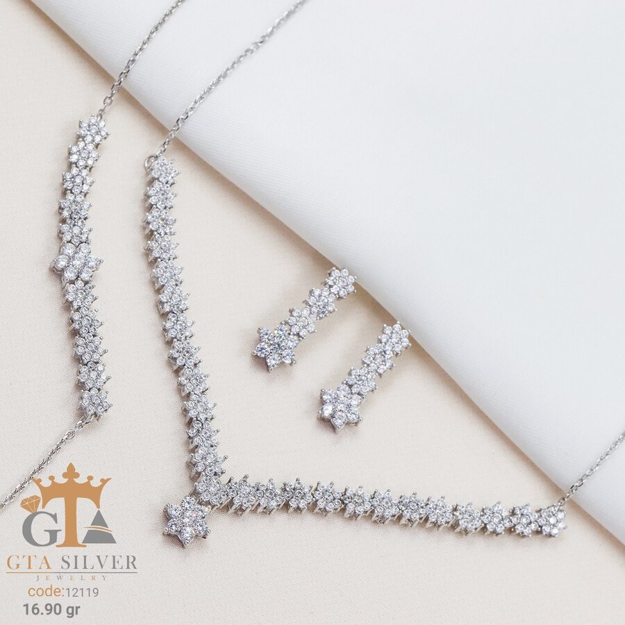 e7959812-3b25-4b7e-947f-e0f7d724e022.jpg سرویس نقره طرح فلاور میکرو زنجیری کد 12119 - Image 1