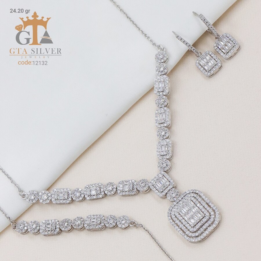 ff176135-fa18-49f3-ba3e-e0bcbc5096bd.jpg سرویس نقره طرح امرالدکات میکرو زنجیری کد 12132 - Image 1