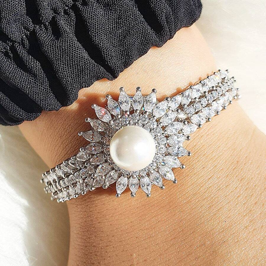 product_a2a61ce4-88f0-48f5-8bac-53386b429db4.jpg دستبند نقره آریسان مرواریدی کد 23002 - تصویر 1